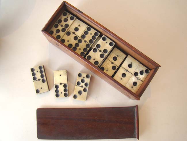 A fine boxed set of Civil War bone and ebony dominoes circa 1865